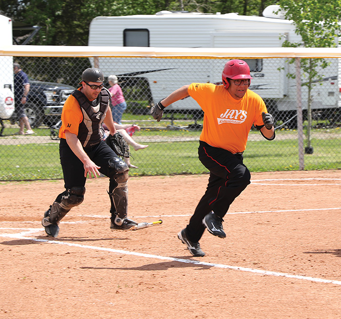 Desmond Kaysaywaysemat of Kahkewistahaw Jays ran to first base during the Fleming Jets vs. Kahkewistahaw Jays game.